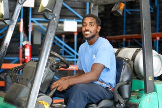 ATD associate on forklift