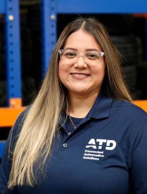 female associate smiling at camera